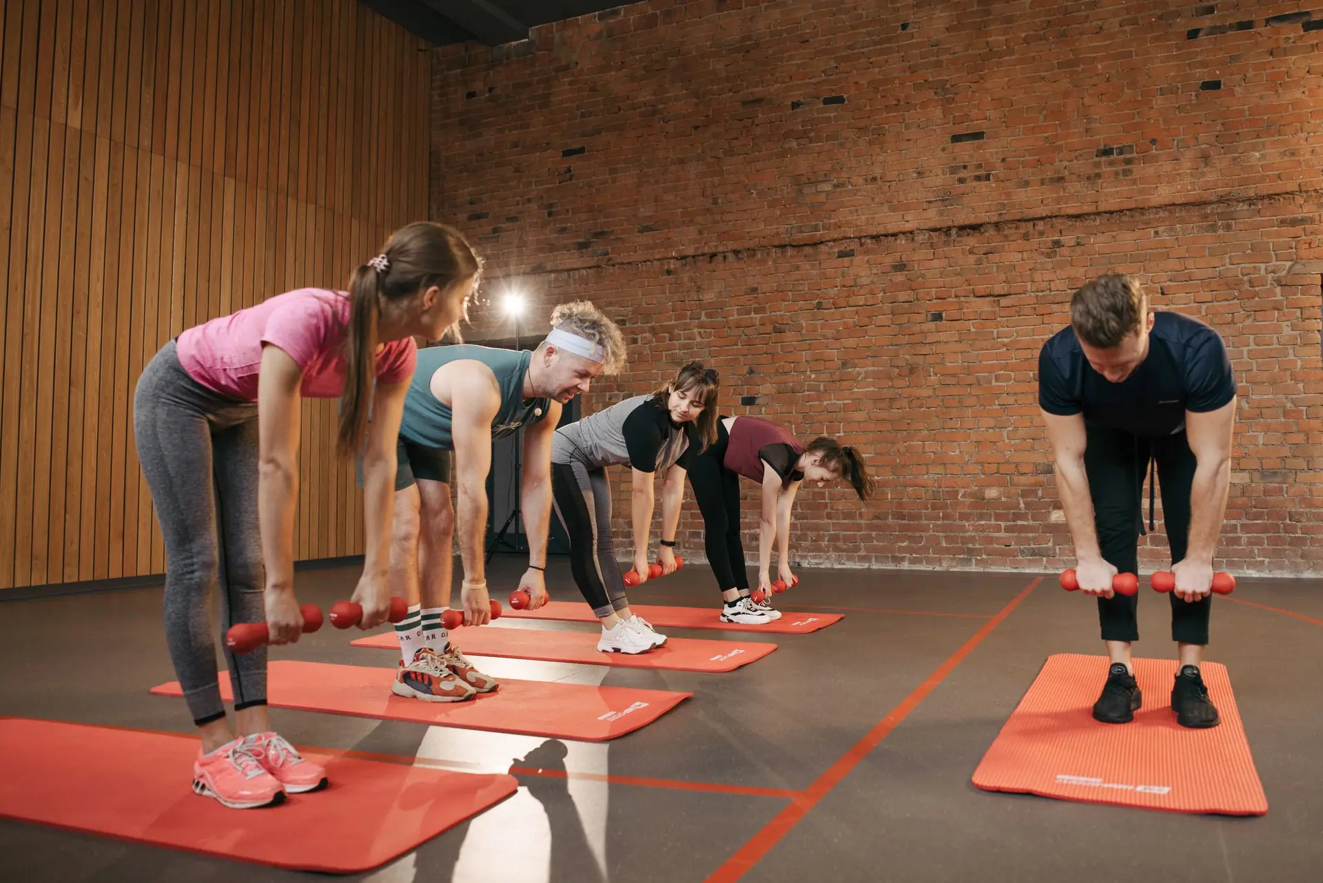 People in a group fitness class on the training floor
